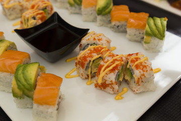 set of various sushi with soya sauce
