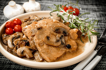 Braised pork chop with mushrooms.