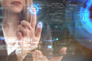 The concept of business, technology, the Internet and the network. A young entrepreneur working on a virtual screen of the future and sees the inscription: Optimization process