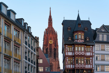 Fototapeta premium Historic center of Frankfurt am Main with the Clock tower Cathedral in the background. the Frankfurt Romerberg square Old city historic center, Hesse, Germany