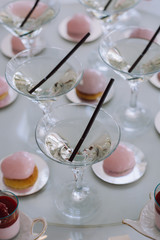 Row of martini glasses  on  bar. Celebration or other event.