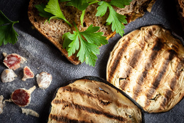 Aubergine and bread with parslay
