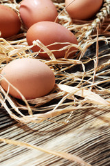 Egg. Fresh farm eggs on a wooden rustic background