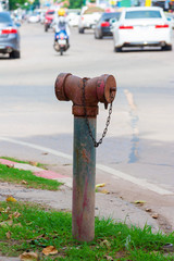 red fire department connection pipe in city
