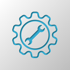 wrench in gear. Paper design. Cutted symbol with shadow