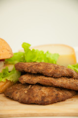 Homemade hamburger with fresh vegetables.