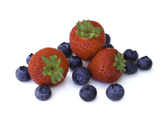 Obraz na płótnie Canvas Fresh and sweet strawberry and blueberry on white background, healthy fruit and diet.