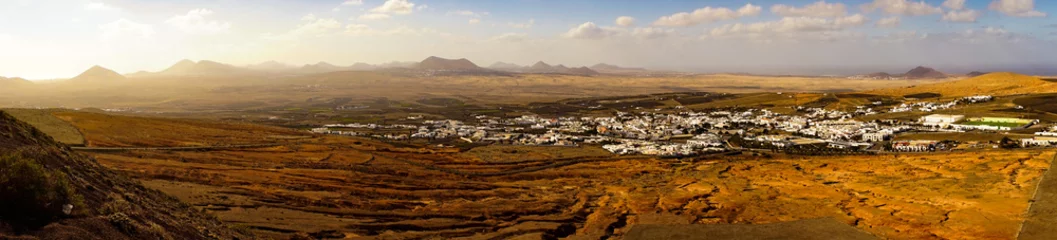 Raamstickers Panorama of Teguise town with desert landscape on Lanzarote Island © valbunny