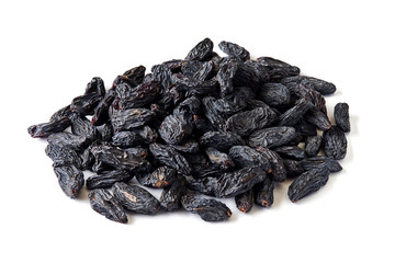 Heap of black raisins isolated on white background.