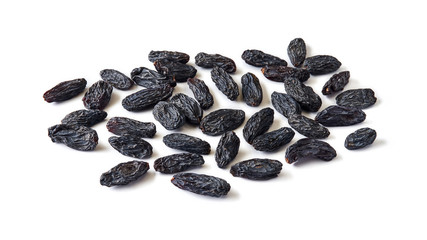 Heap of black raisins isolated on white background.