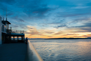Fototapeta na wymiar Sunset on the ferry