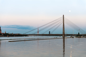 Fototapeta na wymiar The Vanšu Bridge in Riga at sunset