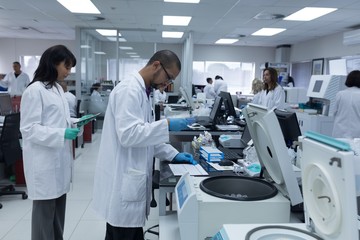 Team of laboratory technicians working in blood bank