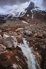 Many rocks before the mountain