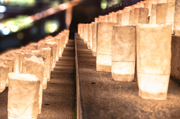 Handmade japanese rice paper lanterns illuminating the steps of the Zojoji temple near the Tokyo Tower during Tanabata Day on July 7th.
