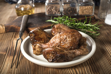 Raw marinated chicken drumsticks.