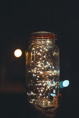 Fairy Lights in Jar at Night Bokeh Background