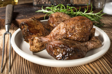 Raw marinated chicken drumsticks.