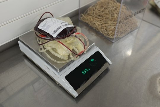 Blood bag on weighing scale machine