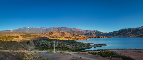 Fototapeta na wymiar Panoramic view of Embalse Potrerillos Dam near Cordillera de Los Andes - Mendoza Province, Argentina