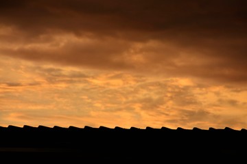 silhouette of roof at evening