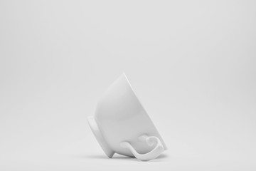 White ceramic cup on a white background