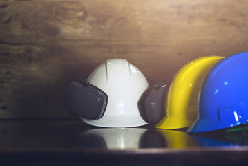 Engineer, electrician and worker 's helmet color as White, Blue and Yellow , PPE  (Personal...