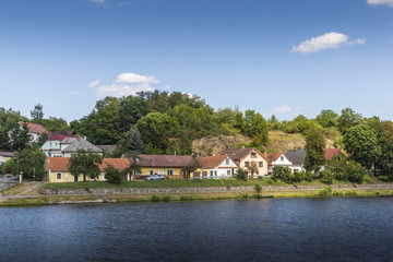 Fototapeta na wymiar The village on the banks of the Vltava river.