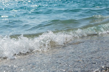 Wave of the Sea on a Beach