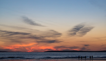 Fototapeta na wymiar Spectacular Sunset sky on ballybunon beach in county Kerry, Wild Atlantic way on the west coast of Ireland