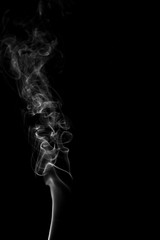 Obraz premium White cloud isolated on black background,Textured smoke,brush effect