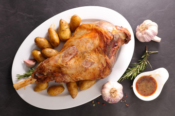 baked lamb leg and potato