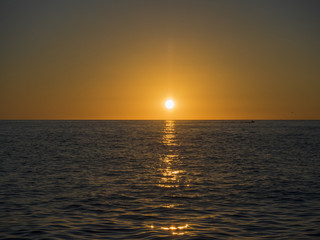 Beautiful sea sunset in warm orange color