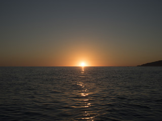 Obraz premium Beautiful sea sunset in warm orange color