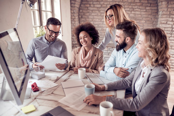 Business people working and discussing at a meeting
