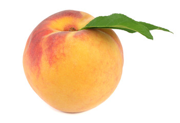 peach fruit with green leaf isolated on white background