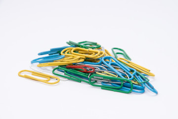 Paper clips in many different colors red blue green