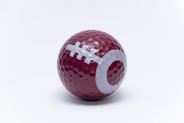 Golfball painted like a american football ball golf balls