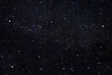 Long exposure night photo. A lot of stars with constellations. Far from the city. Night beautiful landscape.