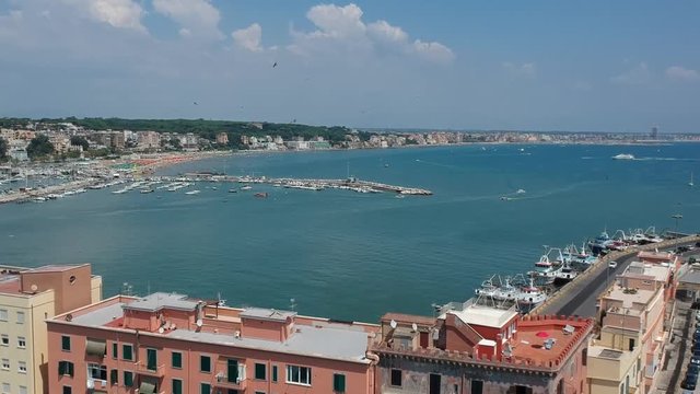 Revealing shot over Italian beach