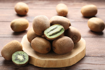 Kiwi fruits on brown wooden table