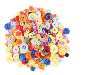 Colorful sewing buttons on white background