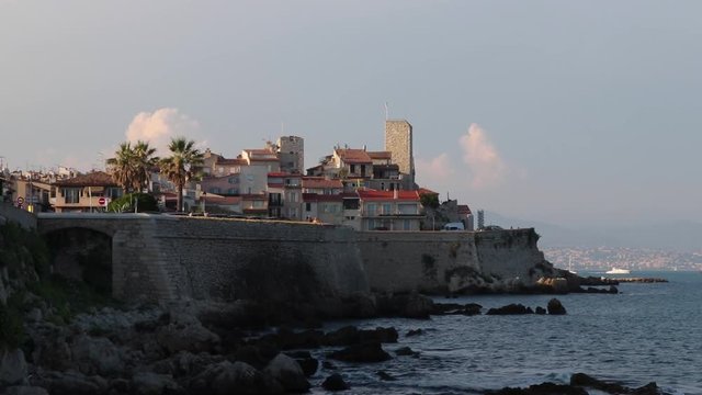 Old Town in Antibes, France, seen from the water, with the tower of the Picasso Museum showing.