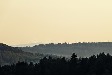 Wind turbines up on mountain. Renewable energy /power.