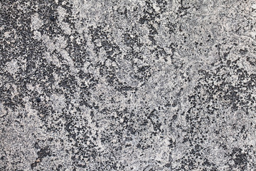 Old concrete wall with cracks. Aged cracked plaster wall background and texture style. Design on cement