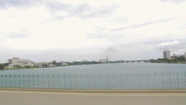 View from inside the car, Driving Over a Bridge In Abidjan, Ivoiry Coast. Going to "le plateau" over the Ebri&eacute; lagoon.