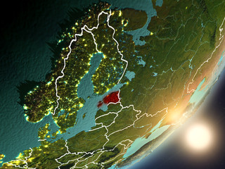Sun rising above Estonia from space
