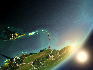 Sun rising above Caribbean from space