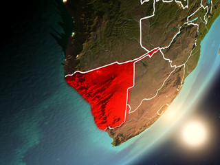 Sun rising above Namibia from space