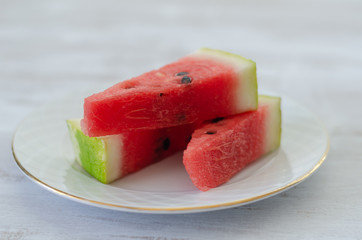  Sliced watermelon on white dish